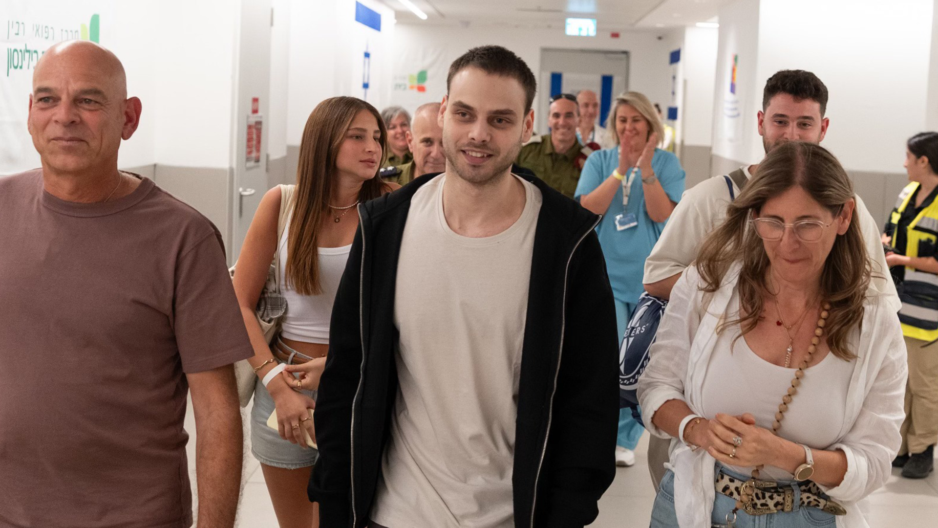 Alon Ohel with his parents, Idit and Kobi Ohel, upon release on October 13, 2025. Photo courtesy of StandWithUs.