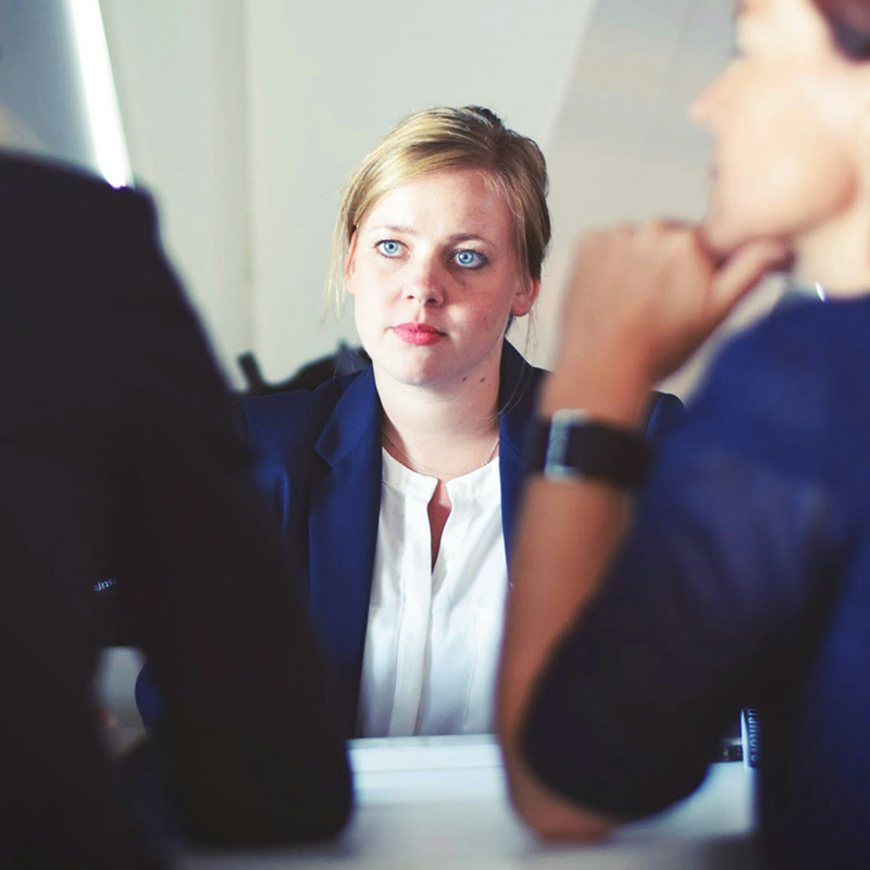 woman listening to professionals