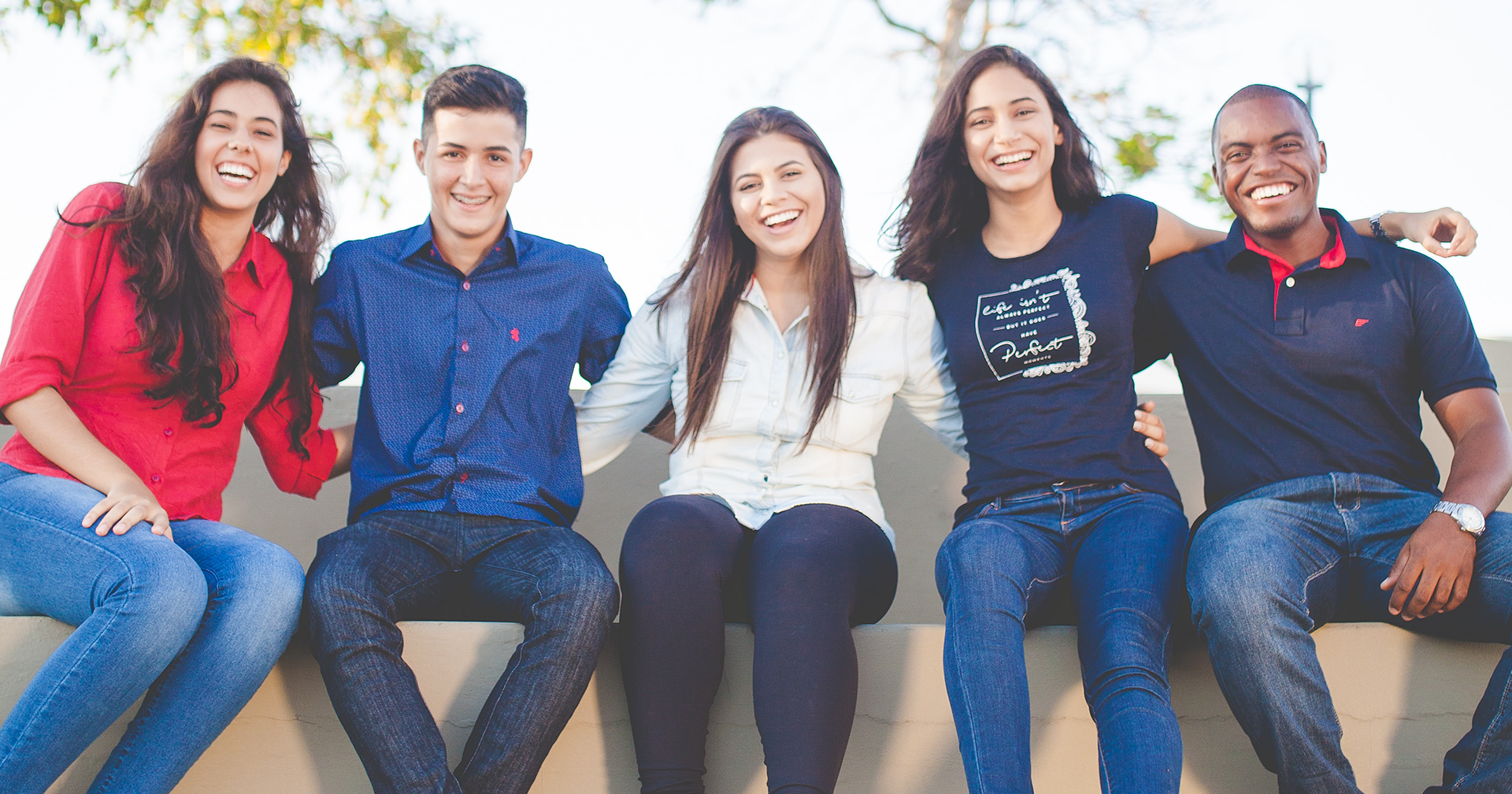 young adults on a bench
